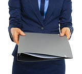 Closeup on business woman giving documents