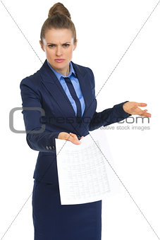 Displeased business woman with document