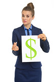 Business woman showing paper sheet with dollar sign