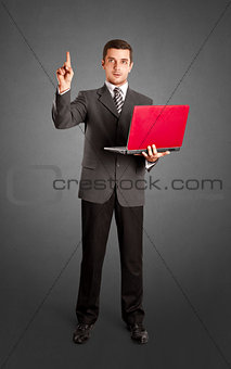Business Man Shows Something With Finger
