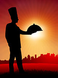 Chef on sunset background with skyline