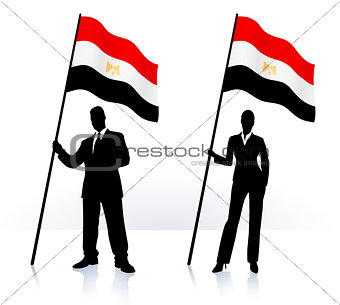Business silhouettes with waving flag of Egypt