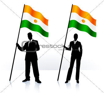 Business silhouettes with waving flag of Niger