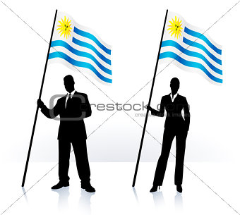 Business silhouettes with waving flag of uruguay