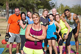 Confident Trainer with Fitness Class