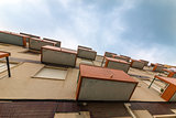 Balconies Old Apartments on cloud sky background