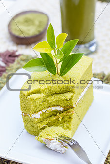 Green tea cake and a glass of Ice Green tea