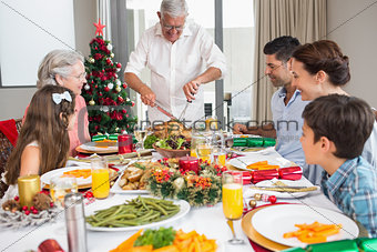 Extended family at dining table for christmas dinner