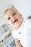 Closeup portrait of a cheerful cute baby