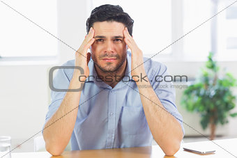 businessman suffering from headache