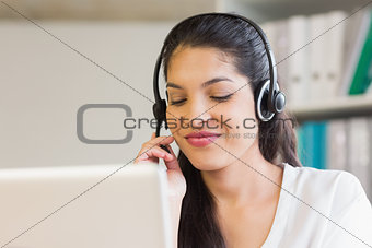 Call center representative using headset