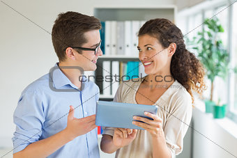 Business people communicating over digital tablet