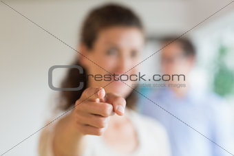 Businesswoman pointing in office