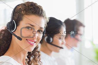Beautiful businesswoman wearing headset