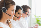 Smiling businesswoman working in call center