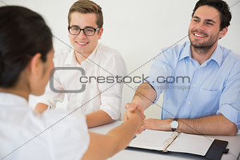 Business people greeting in meeting