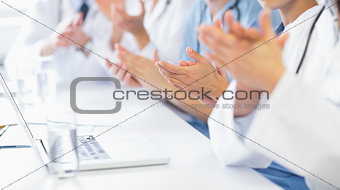 Medical team clapping