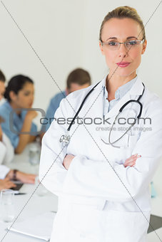 Portrait of doctor standing arms crossed