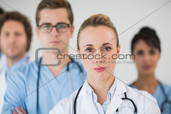 Doctor with colleagues in hospital