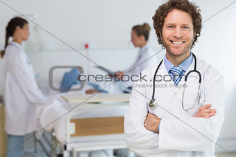 Portrait of doctor standing arms crossed
