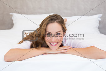 Woman lying in bed