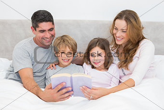 Family reading storybook