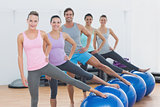 Fitness class with exercise balls at fitness studio
