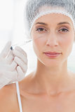 Attractive woman having botox injection