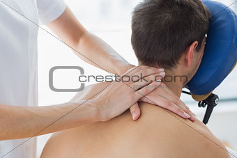 Patient receiving shoulder massage