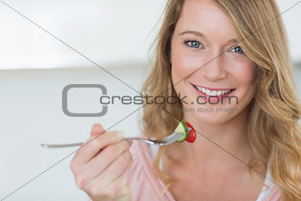Closeup of woman having salad