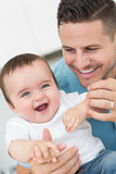Happy baby with father