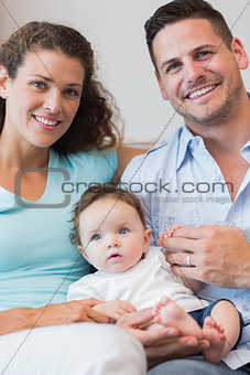 Happy parents with baby boy