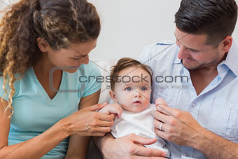 Parents spending leisure time with baby