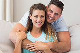 Portrait of loving couple at home
