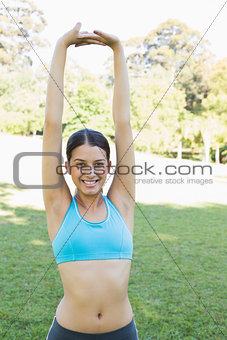 Woman stretching at park