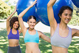 Women exercising with fitness balls