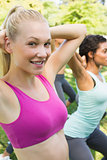 Woman exercising with friends