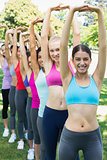 Multiethnic women exercising at park