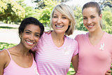 Multiethnic volunteers participating in breast cancer awareness