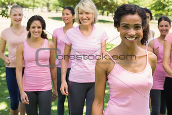 Women participating in breast cancer awareness at park