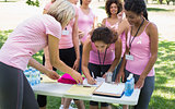 Participants registering for breast cancer campaign