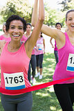 Breast cancer participants winning marathon race
