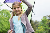 Portrait of cute young girl with a kite