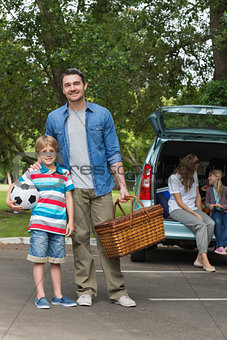 Family with two kids at picnic