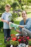 Mother and son engaged in gardening