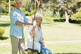Portrait of a happy mature couple at park