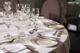 Set table with white linen