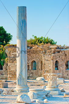 stone pillar on the background of the ancient ruined city