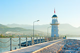 old lighthouse in Alanya on the background of mountains