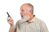 senior bald man talking using walkie-talkie